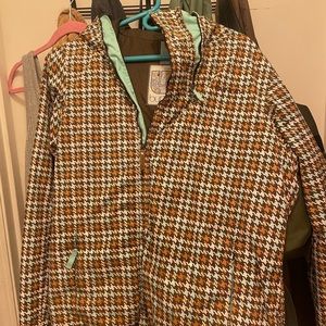 Brown and blue houndstooth snowboarding jacket